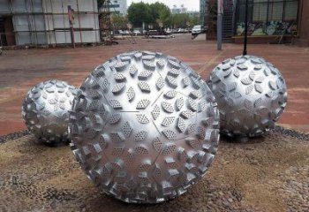 鏤空球雕塑廠家 凸凹圖案設(shè)計 不銹鋼鏤空球雕塑加工