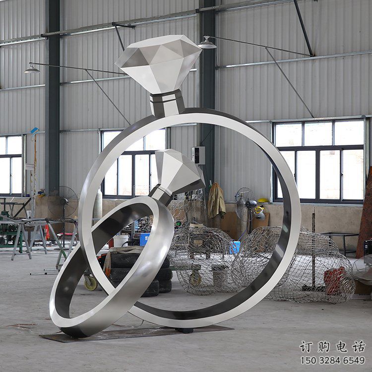 房地產(chǎn)戒指雕塑廠家 鏤空擺件 鍛造不銹鋼戒指雕塑